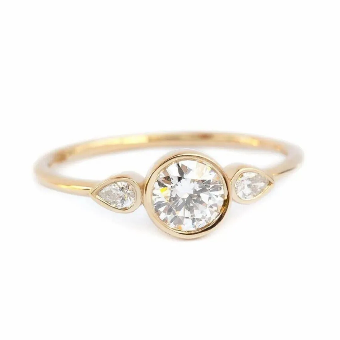 /public/photos/live/Round And Pear Cut Three Stone Dainty Wedding Ring 647 (2).webp